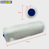 Self‑levelling spiked roller
