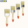 Paint brush with red marked handle